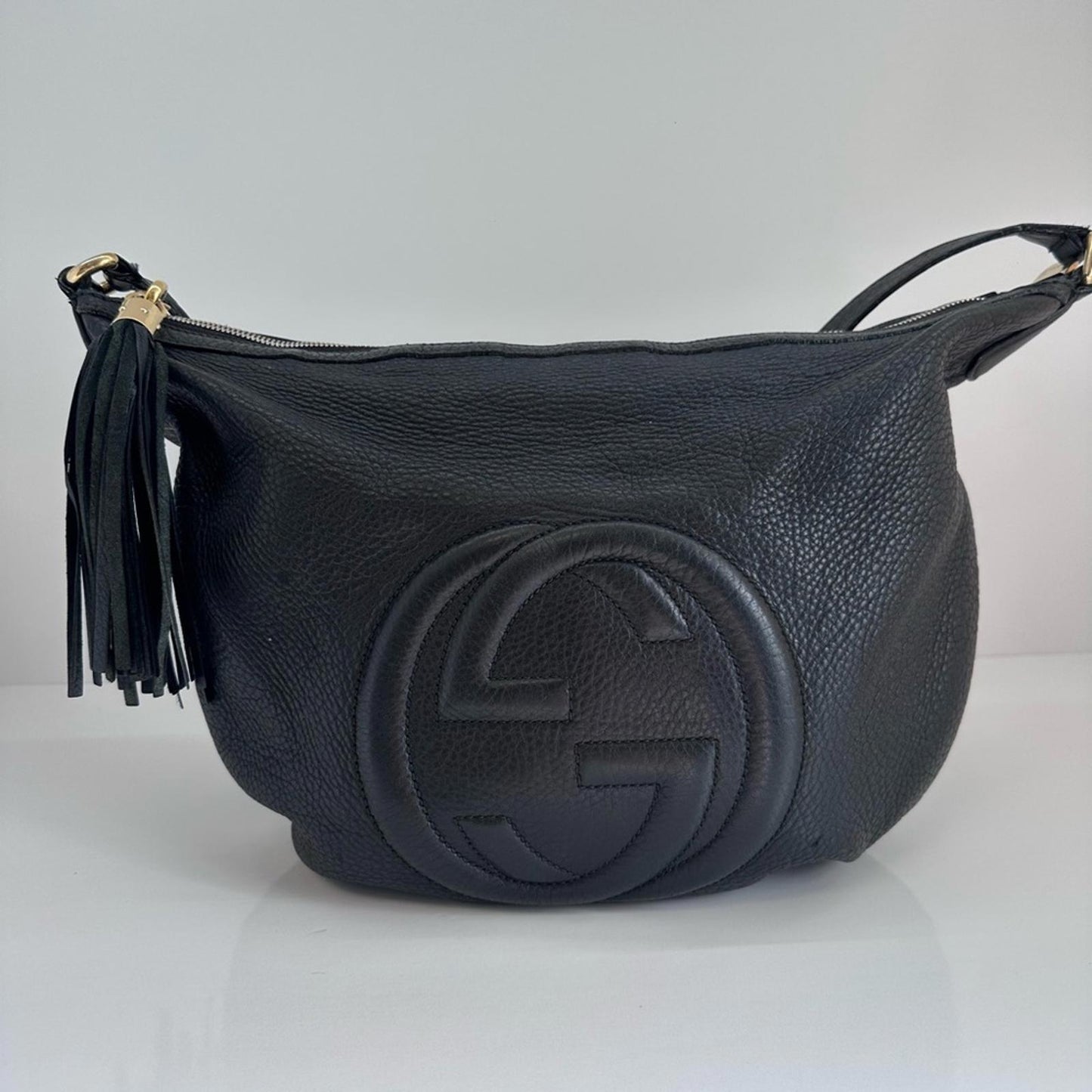 Gucci Black Leather Shoulder Bag with Tassel Accent