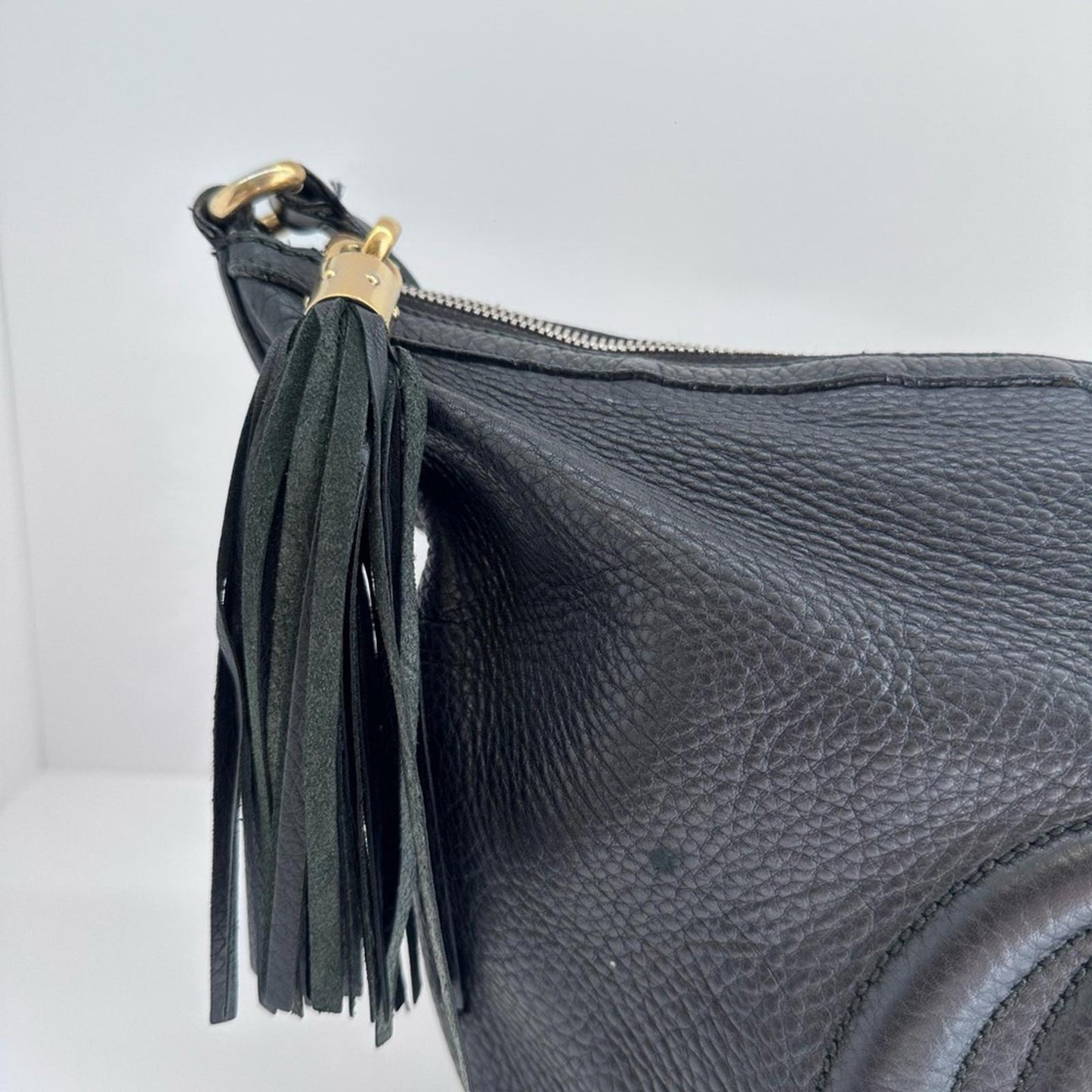 Gucci Black Leather Shoulder Bag with Tassel Accent