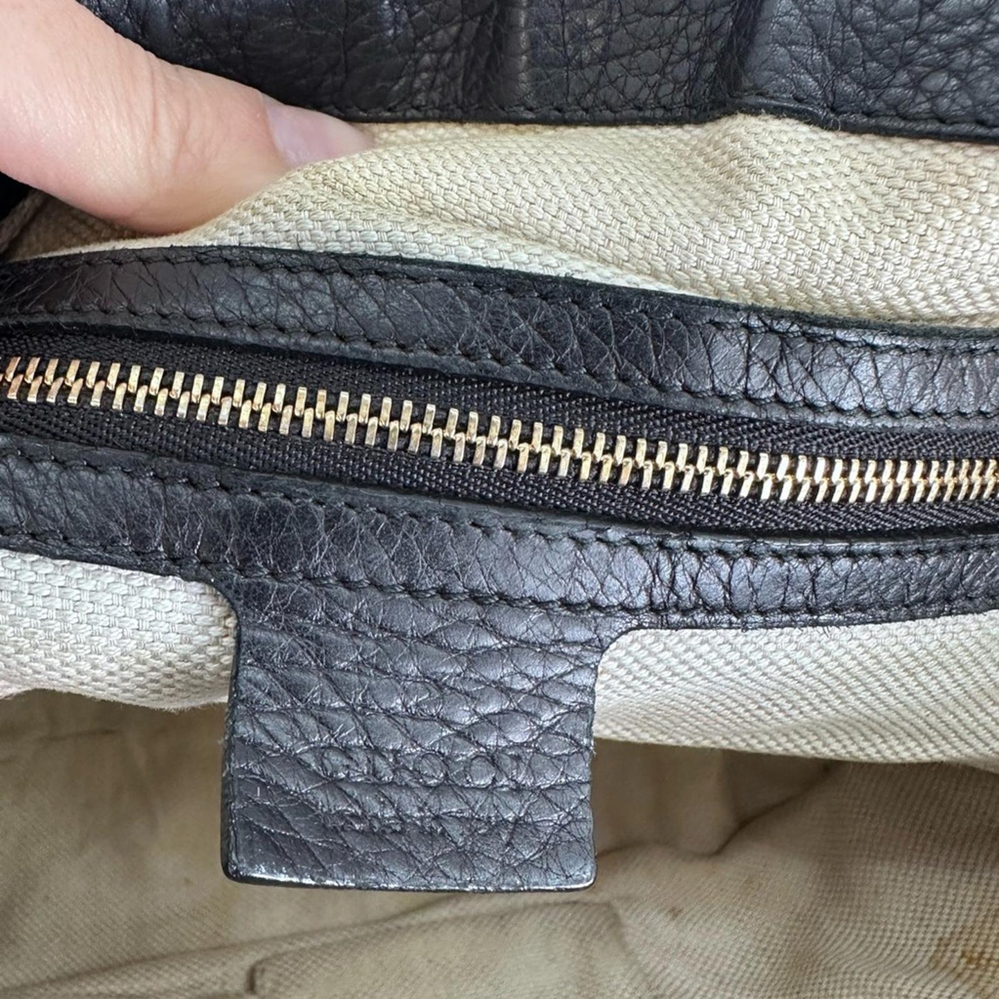 Gucci Black Leather Shoulder Bag with Tassel Accent